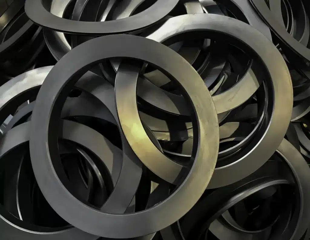 Belleville disc springs are often used as spring washers under bolts.