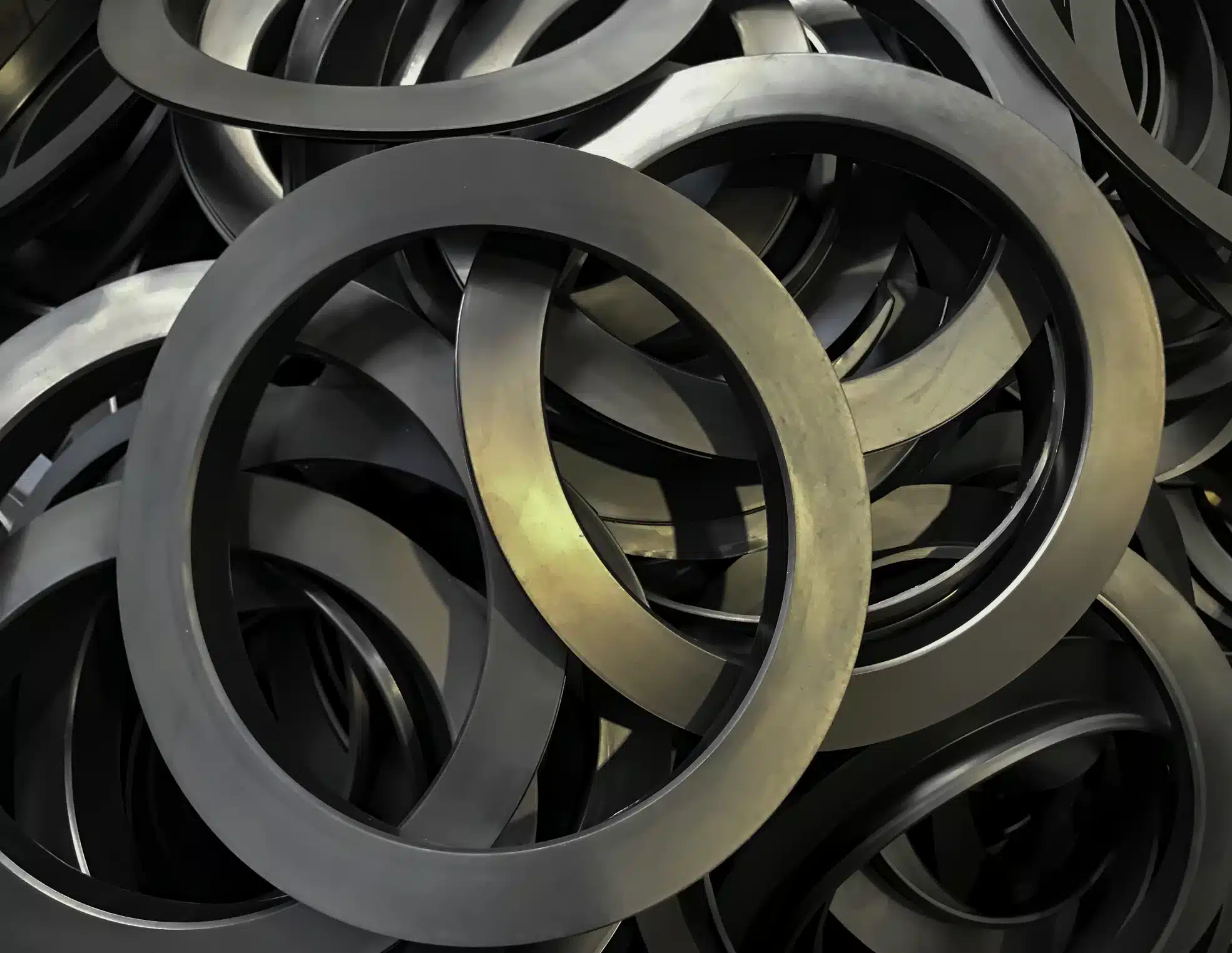 Belleville disc springs are often used as spring washers under bolts.